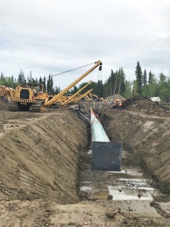 Installing pipe at a road crossing on CGL right-of-way